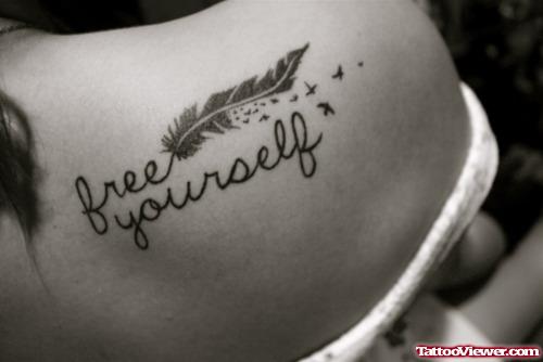 Free Yourself Feather Tattoo On Upperback