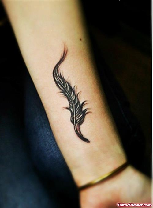 Cute Feather Tattoo On Left Forearm