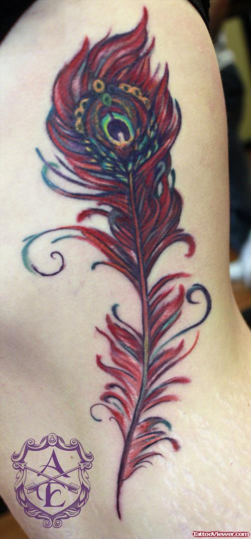 Colored Ink Peacock Feather Tattoo On Side