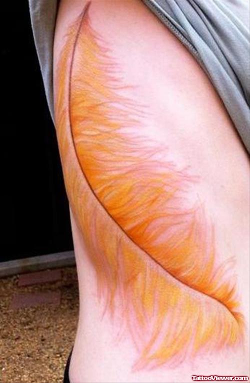 Beautiful Yellow Feather Tattoo On Side