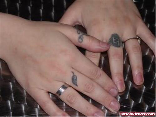 Vanessa Feather Tattoo On finger
