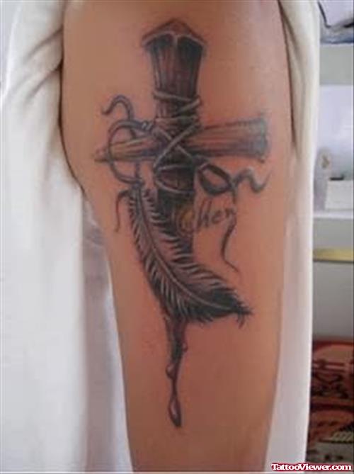 Cross And Feather Tattoo