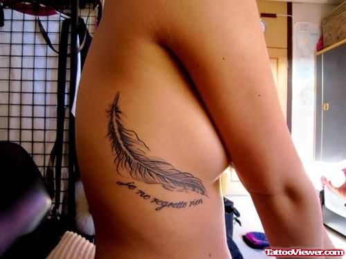 Feather Tattoo On Rib For Girls
