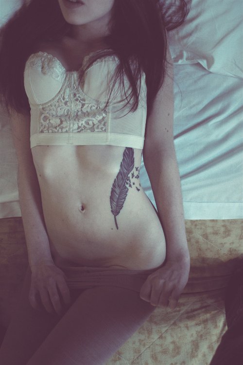 Feather Tattoo On Stomach