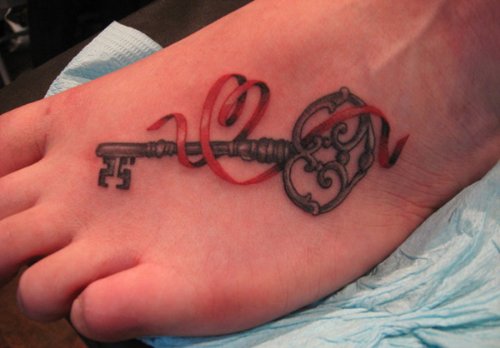 Heart And Key Foot Tattoo