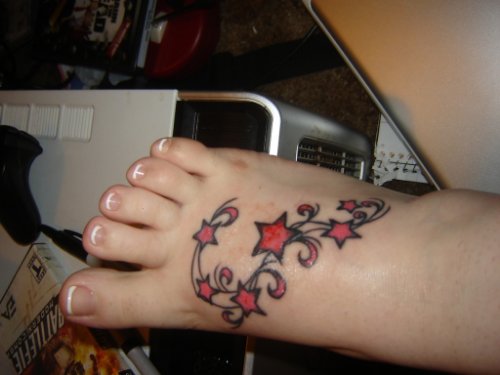 Red Ink Stars Feet Tattoo