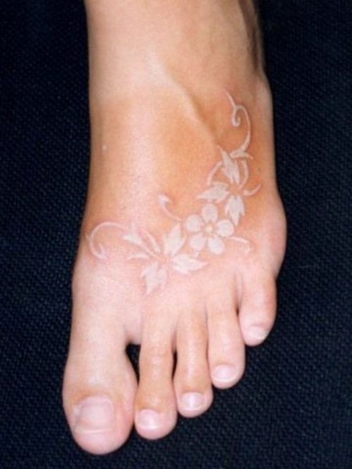 White Ink Feet Tattoo