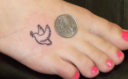 Flying Dove Feet Tattoo