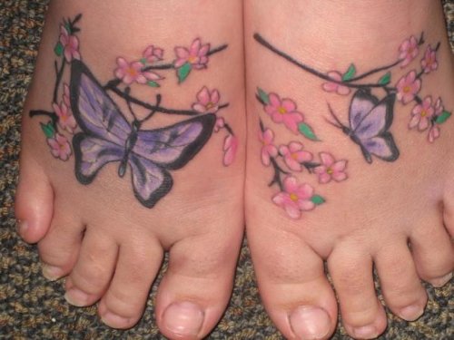 Color Flowers And Butterflies Tattoo On Feet