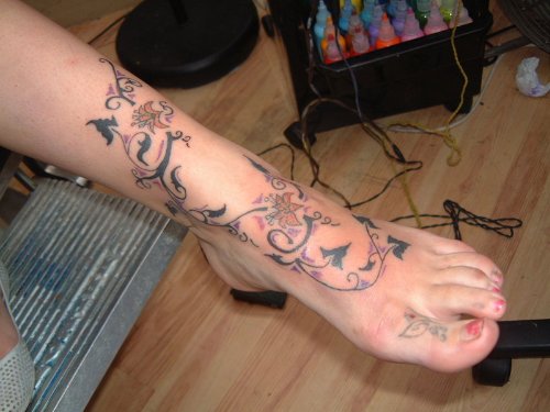 Vine Leaves Tattoo On Foot