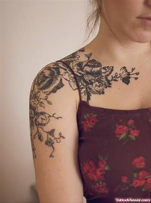 Grey Ink Feminine Tattoo On Girl Right Shoulder