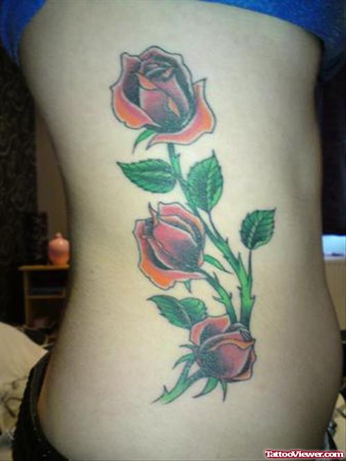 Red Roses Feminine Tattoo On Girl Side Rib