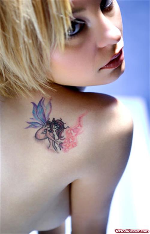 Colored Faity Feminine Tattoo On Back Shoulder