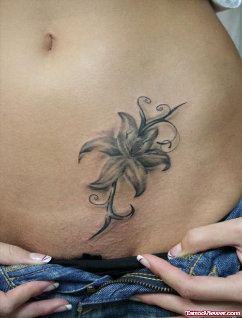 Grey Ink Flower Feminine Tattoo On Hip