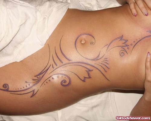Tribal Feminine Tattoo On Girl Side