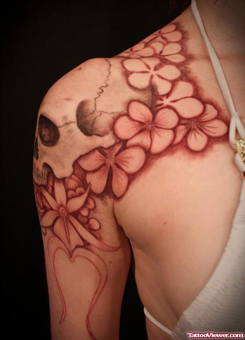 Skull And Flower Feminine Tattoo On Shoulder