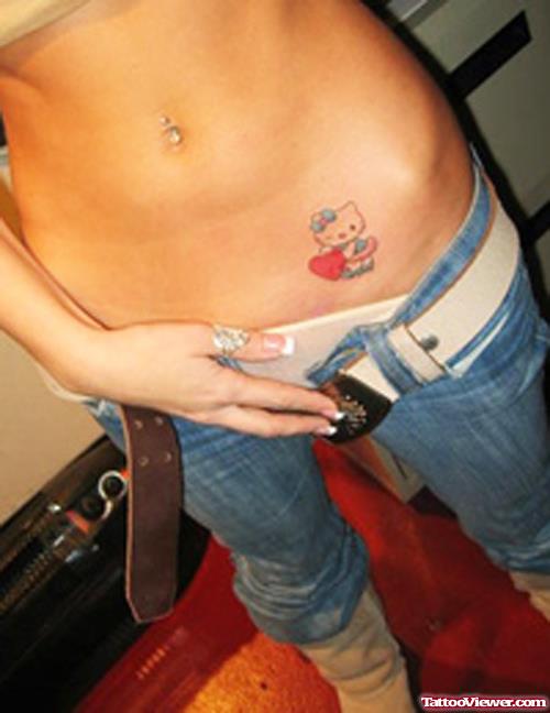 Kitty With Red Heart Feminine Tattoo On Hip