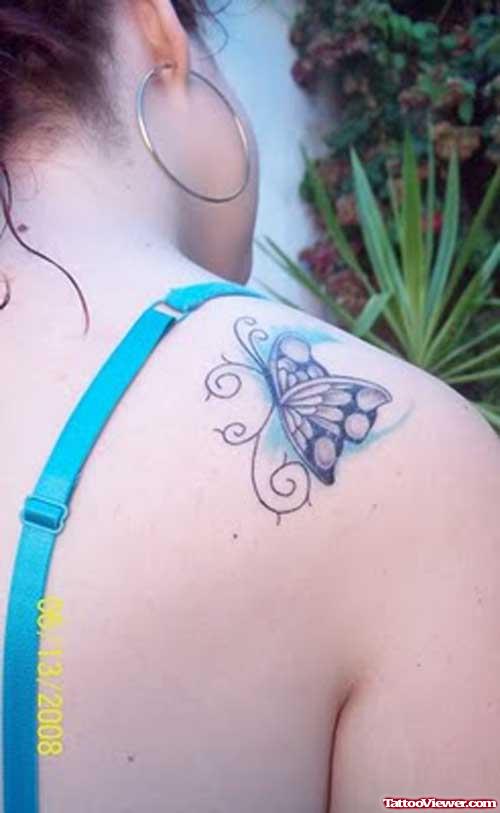Grey Ink Butterfly Tattoo On Back Shoulder