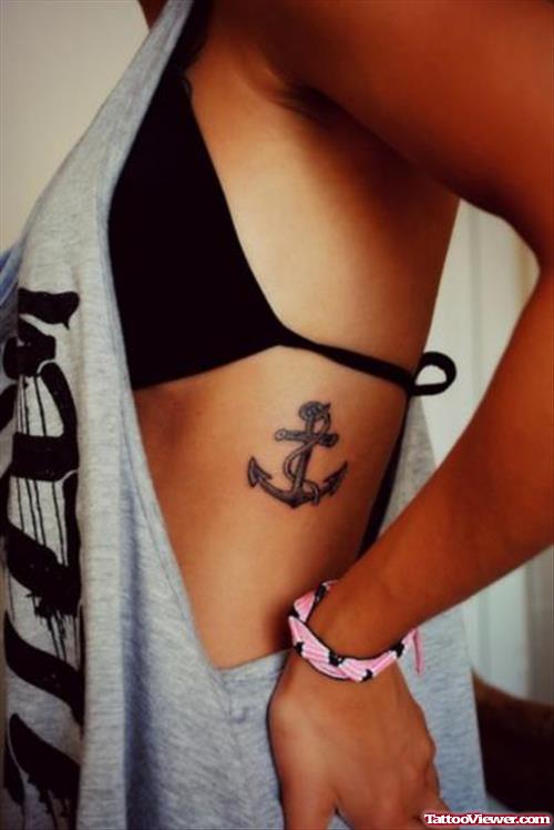 Small Anchor Feminine Tattoo On Rib Side