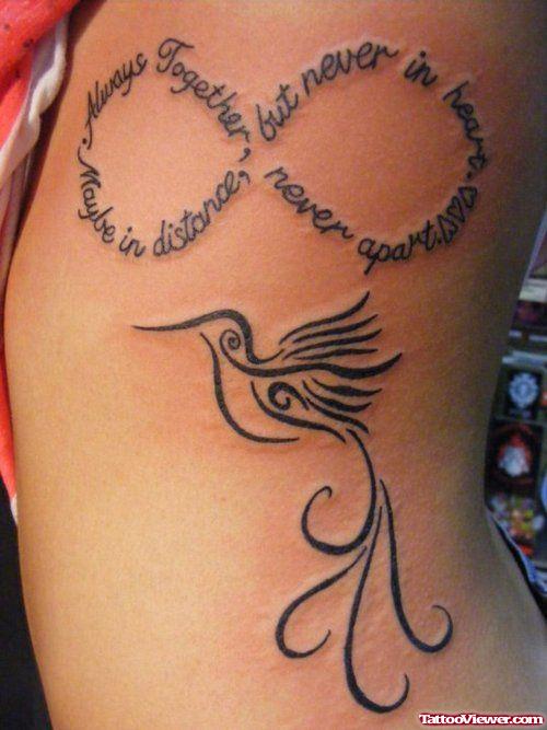 Infinity And Tribal Phoenix Feminine Tattoo On Side Rib