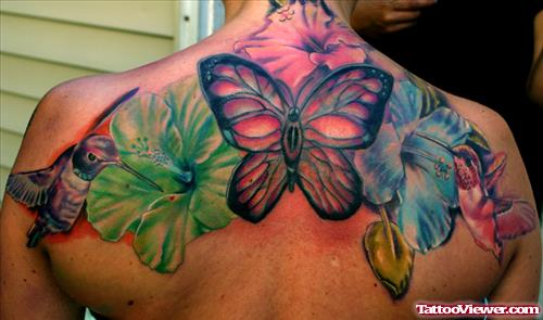 Hummingbird And Colored Flowers Feminine Tattoo On Upperback
