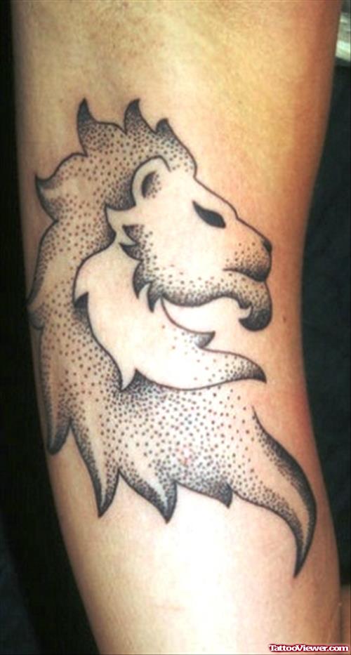 Grey Ink Lion Head Feminine Tattoo