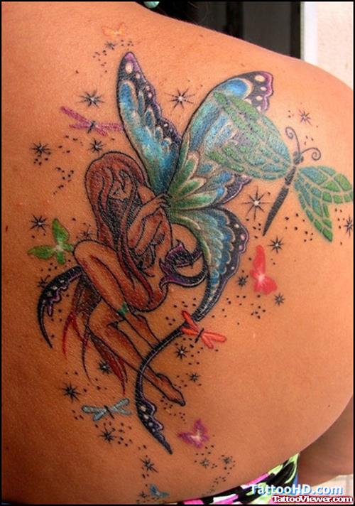 Colored Fairy Feminine Tattoo On Right Back Shoulder