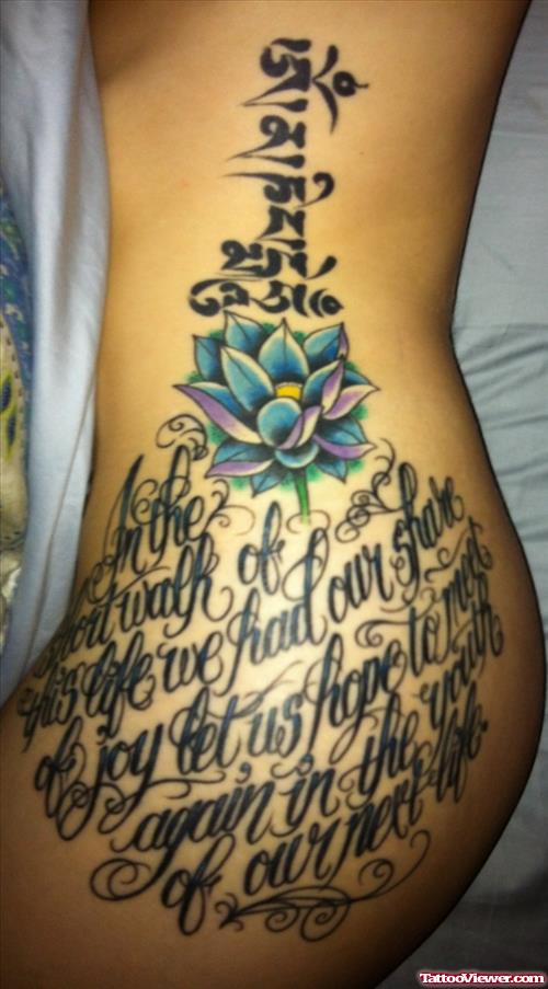 Lettering And Lotus Flower Feminine Tattoo On Side Rib