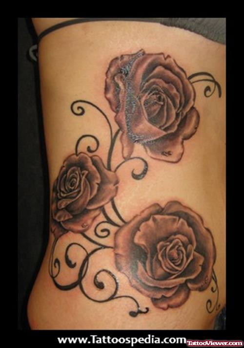Grey Ink Rose Flowers Feminine Tattoo On Side Rib