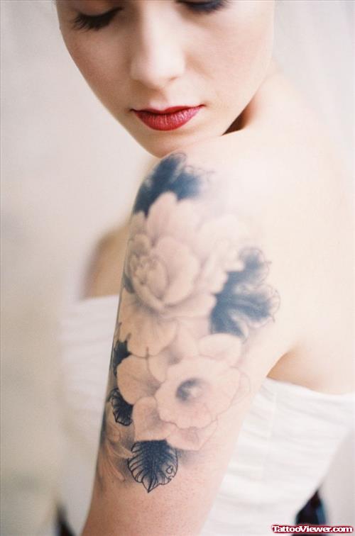 Grey Ink Flowers Feminine Tattoo On Left Shoulder