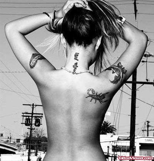 Feminine Tattoo On Back And Half Sleeve