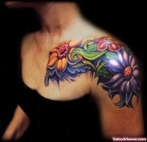 Colored Flowers Feminine Tattoo On Girl Left Shoulder