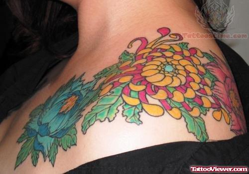 Beautiful Colored Flowers Feminine Tattoo On Left Shoulder
