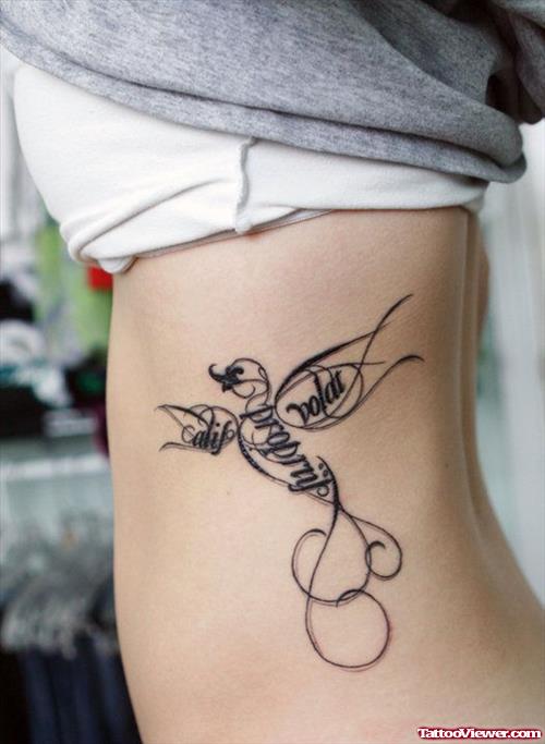 Flying Bird Feminine Tattoo On Side Rib