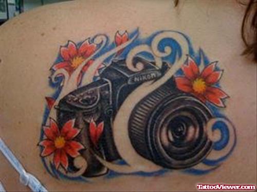 Flowers And Camera Feminine Tattoo On Back Shoulder