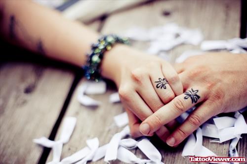 Feminine Tattoos On Fingers