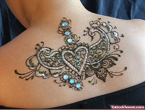 Awesome Henna Feminine Tattoo On Upperback
