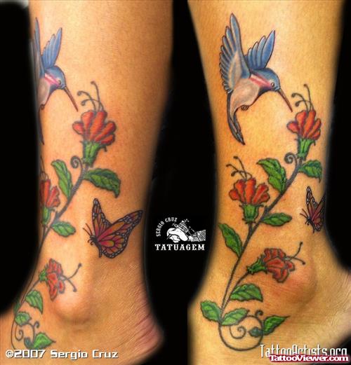 Colored Feminine Tattoo On Leg