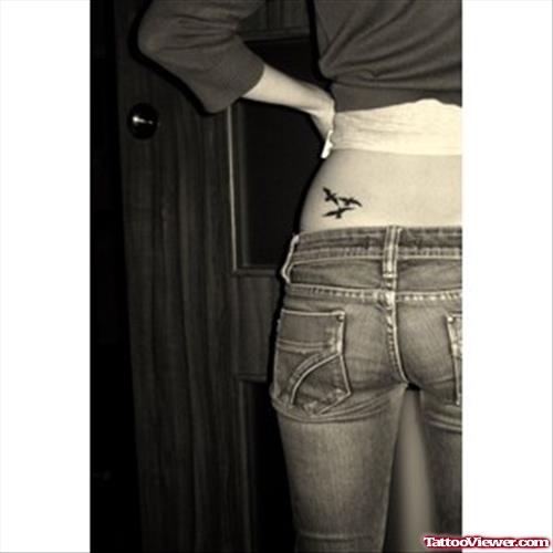 Feminine Tattoo On Girl Lowerback