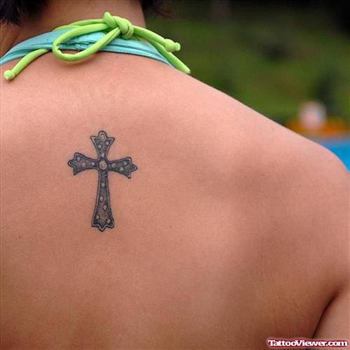 Cross Feminine Tattoo On Upperback
