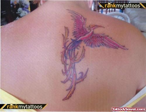Colored Flying Phoenix Feminine Tattoo On Back