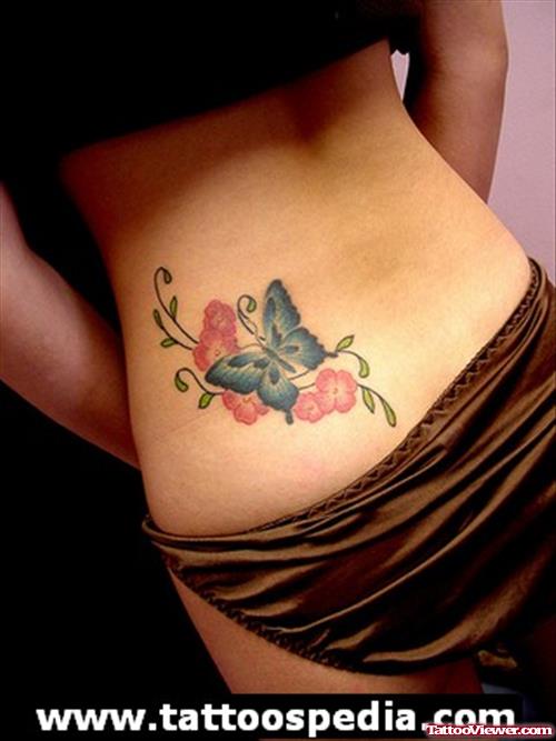 Butterfly And Flowers Feminine Tattoo On Lowerback