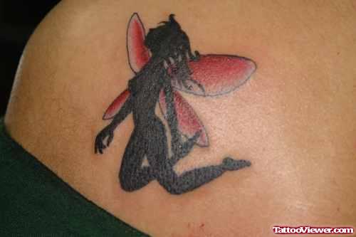 Black Ink Fairy Feminine Tattoo On Shoulder