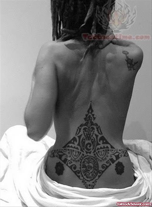 Attractive Feminine Tattoo On Girl Lowerback