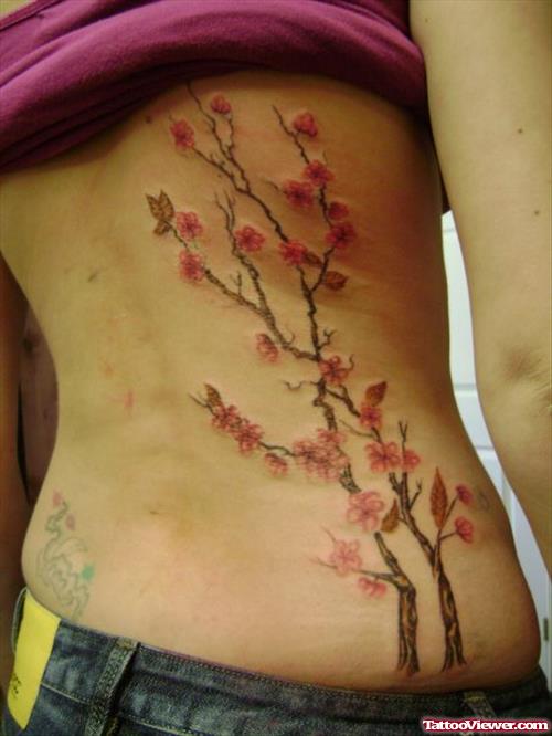 Beautiful Feminine Tattoo On Girl Rib Side