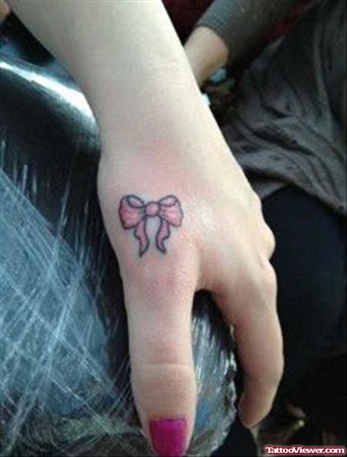 Feminine Bow Tattoo On Hand