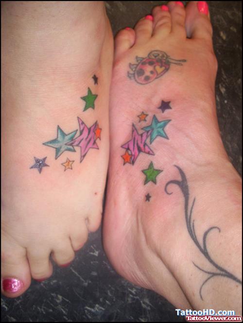Colored stars Feminine Tattoo On Leg