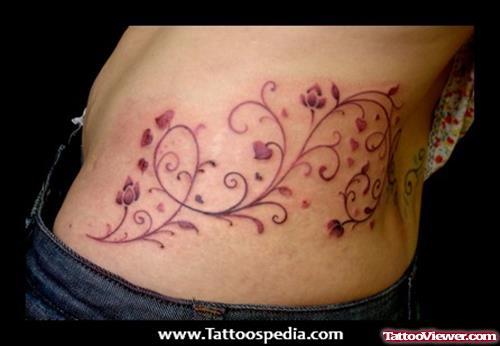 Beautiful Feminine Rib Side Tattoo