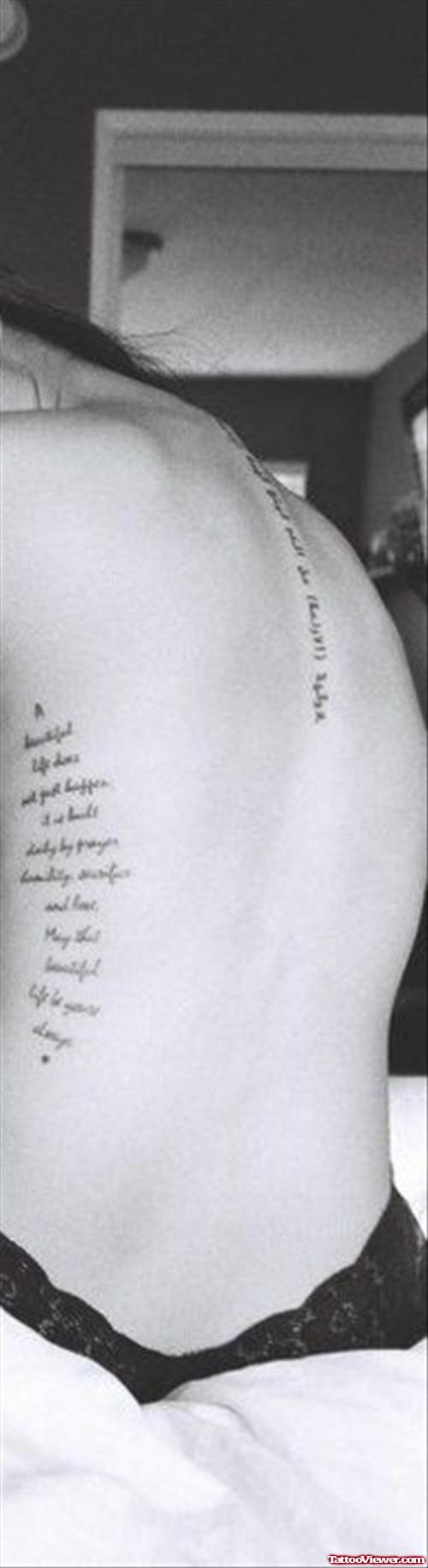 Feminine Lettering Tattoo On Back