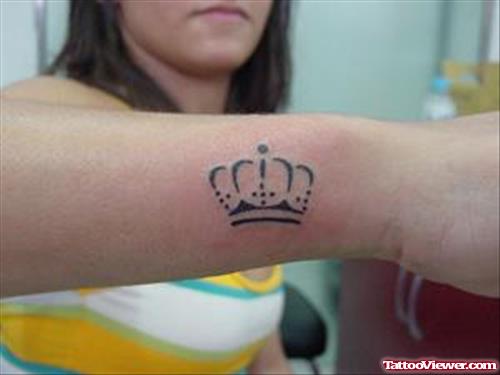 Crown Feminine Tattoo On Girl Forearm